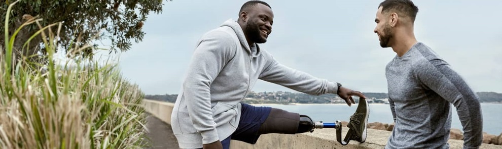 two men stretching after a run