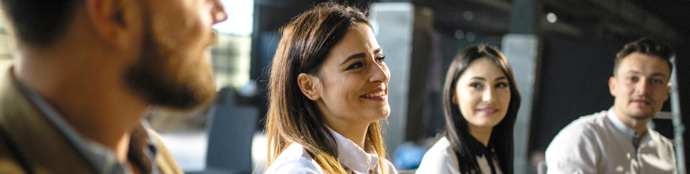 corporate group listening to financial adviser