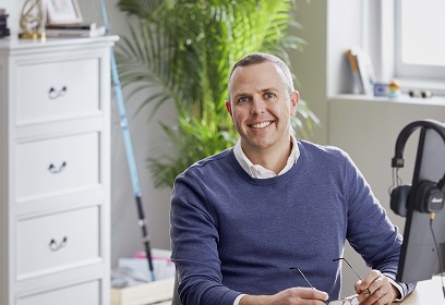 Smiling man in office