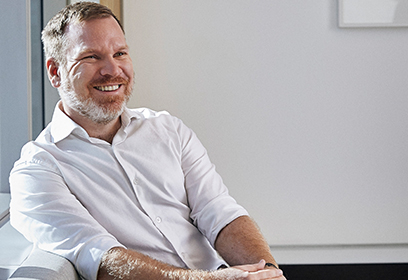 Happy man in office